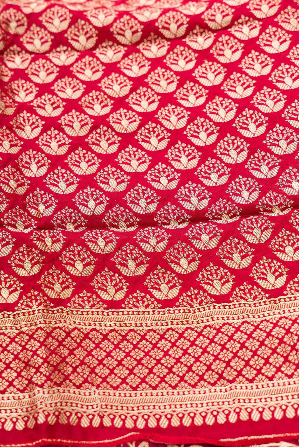 Close up blouse image of Imperial Red Banarasi Silk Womens Lehenga set featuring Zari Brocade Choli paired with Imperial Red Zari Brocade Skirt with Zari Border and a Zari Butta dupatta in Imperial Red