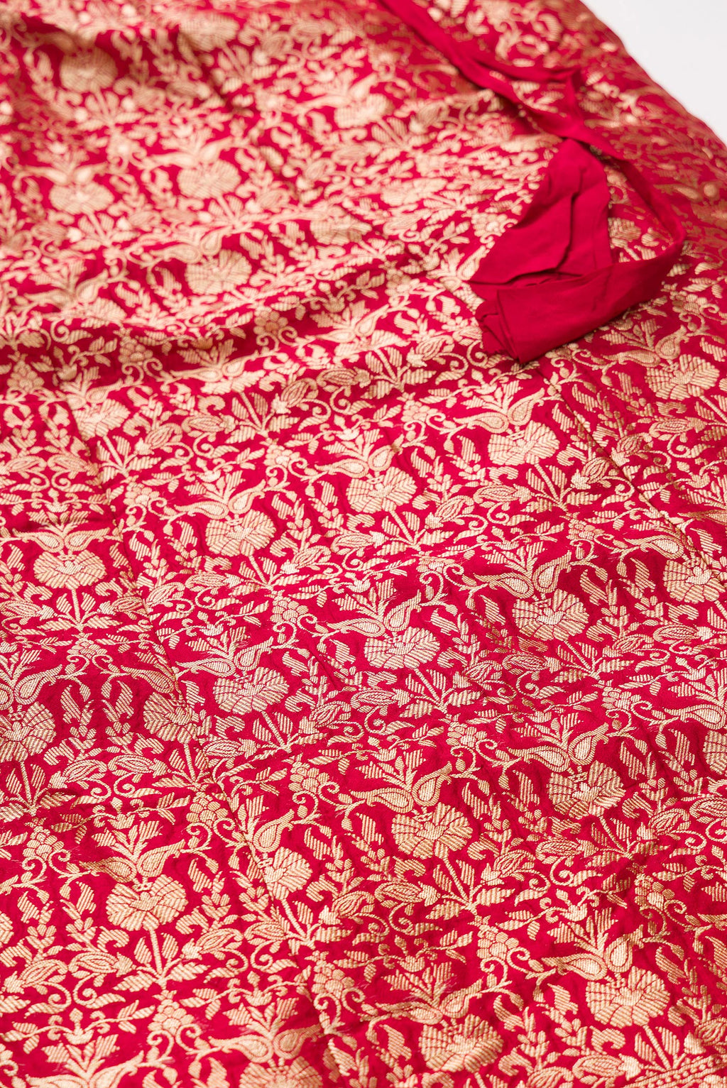 Detailed shot of Imperial Pink Banarasi Silk Womens Lehenga set featuring Zari Brocade Choli paired with Imperial Pink Zari Brocade Skirt with Zari Border and a Zari Butta dupatta in Imperial Pink