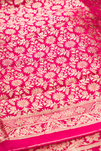 Close up blouse image of Dark Pink Banarasi Silk Womens Lehenga set featuring Zari Brocade Choli paired with Dark Pink Zari Brocade Skirt with Zari Border and a Zari Butta dupatta in Dark Pink