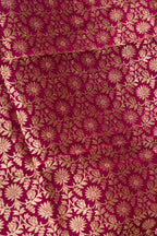 Close up blouse image of Magenta Banarasi Silk Womens Lehenga set featuring Zari Brocade Choli paired with Magenta Zari Brocade Skirt with Zari Border and a Zari Butta dupatta in Magenta