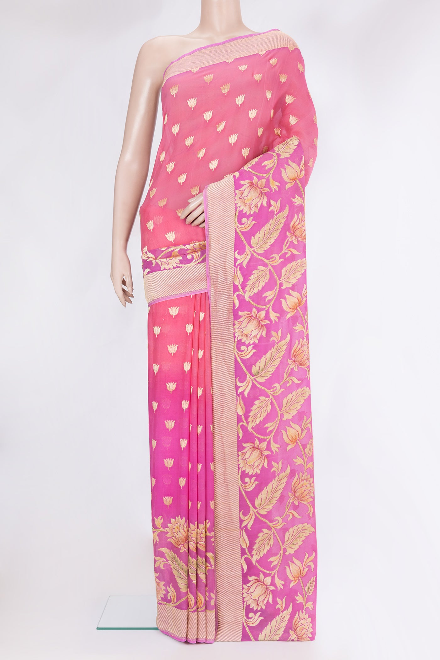 Pink Banarasi Georgette Saree with Zari Butta on the body and Fancy Border.  displayed on a mannequin