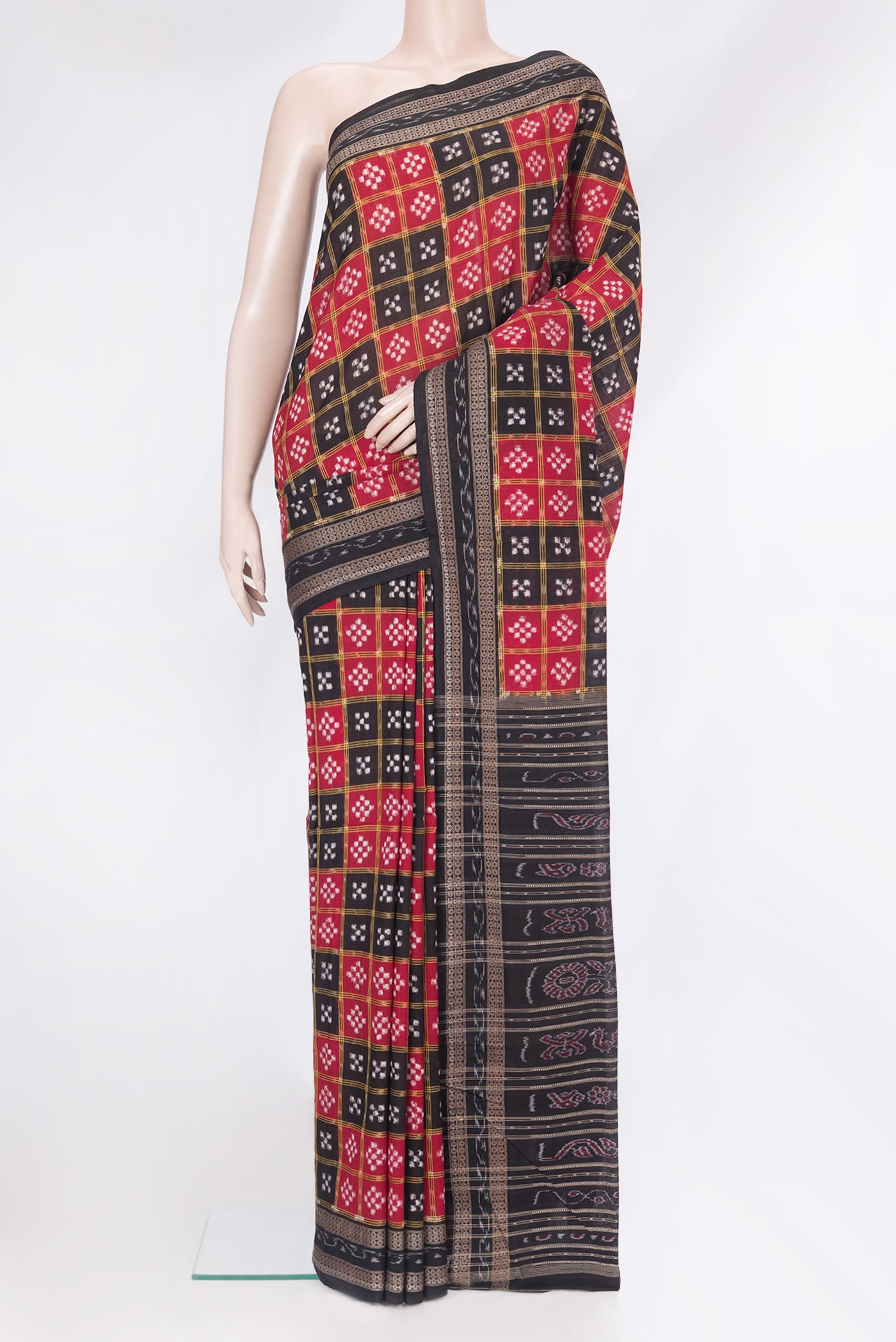 Multi Color Double Ikat Saree with Printed design on the body and Thread Border.  displayed on a mannequin