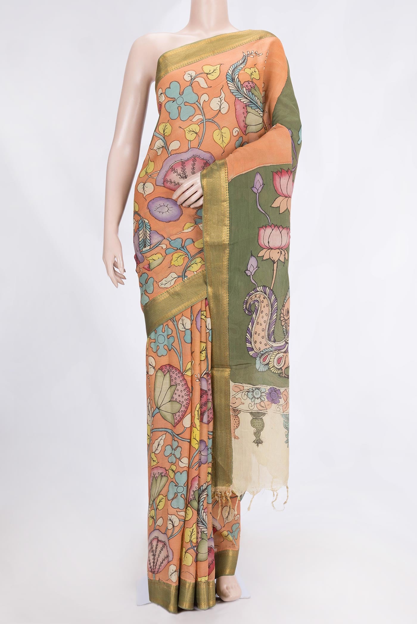 Peach Dual Tone Tussar Saree with kalamkari Print on the body and Zari Border.  displayed on a mannequin