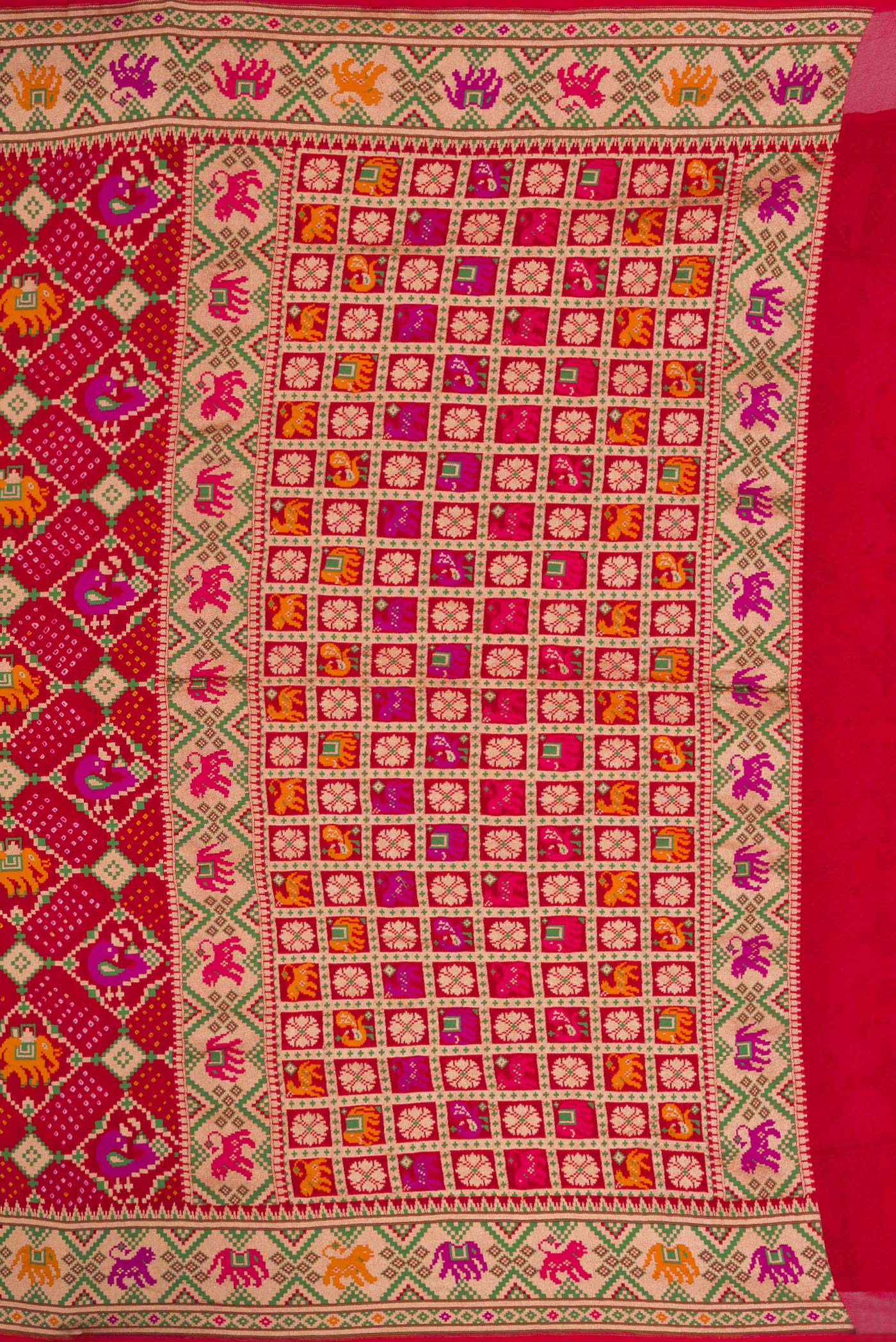 Close up image of the pallu of Red Dual Tone Banarasi Georgette Saree with Bandhani Print on the body and Fancy Border. 