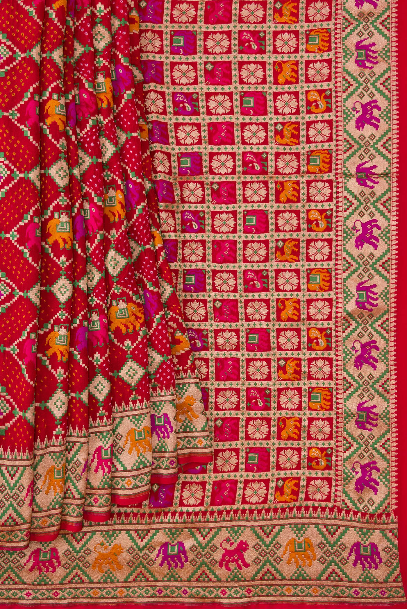 Pleats and pallu of Red Dual Tone Banarasi Georgette Saree with Bandhani Print on the body and Fancy Border. 