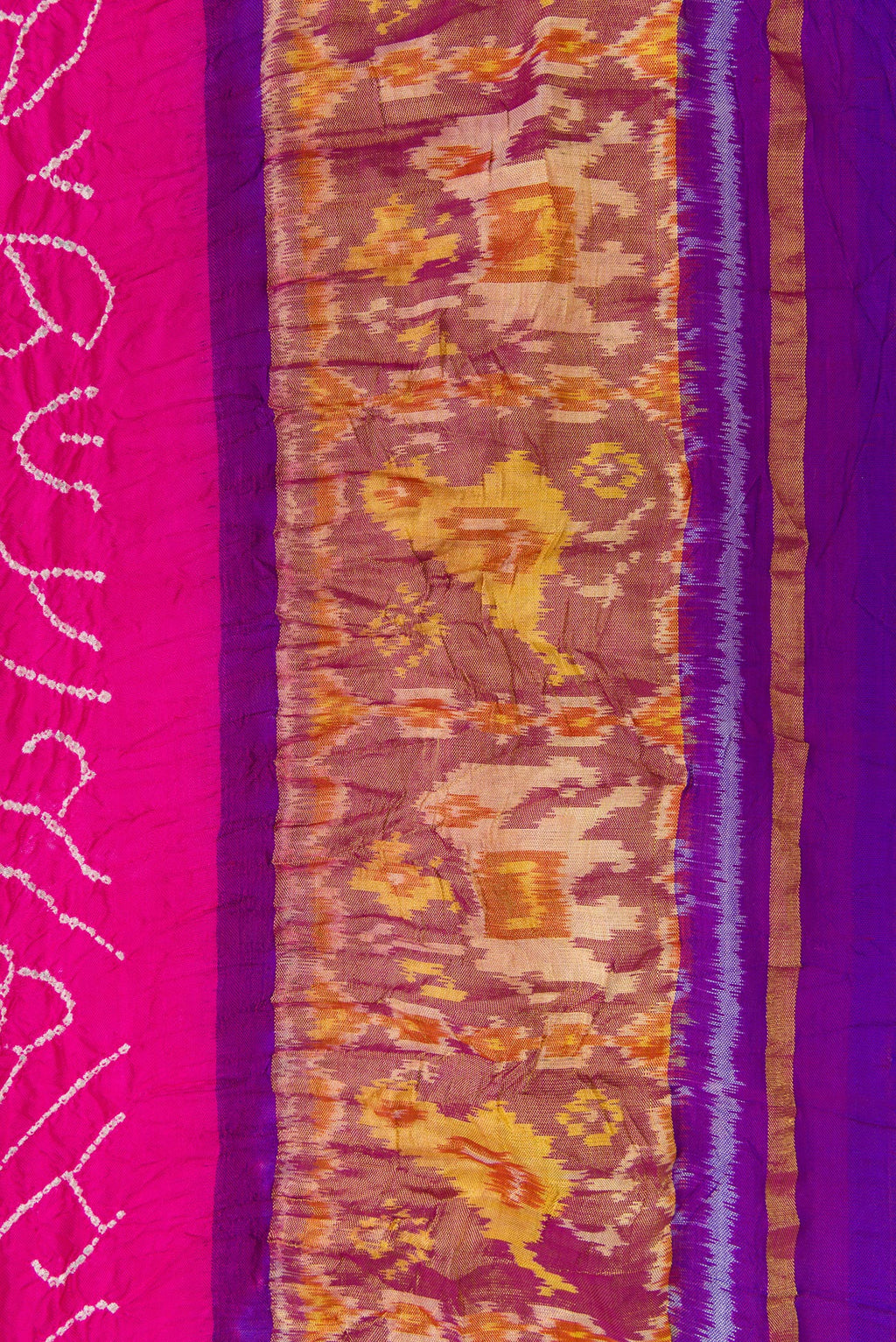 Border image of Pink Dual Tone Bandhani Silk Saree with Bandhani Print on the body and Ikat Border. 