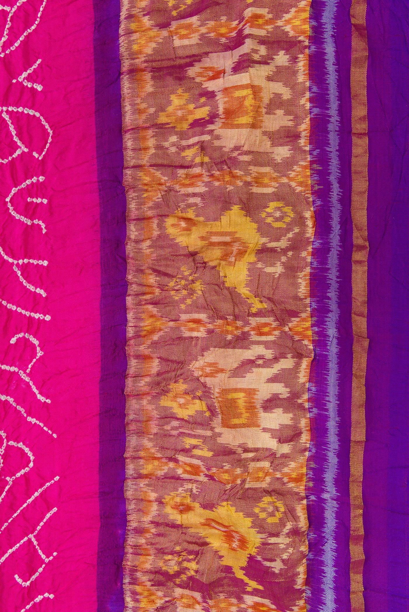 Border image of Pink Dual Tone Bandhani Silk Saree with Bandhani Print on the body and Ikat Border. 