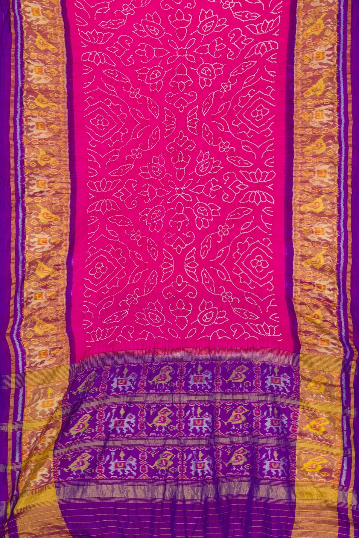 Flat view of Pink Dual Tone Bandhani Silk Saree with Bandhani Print on the body and Ikat Border. 
