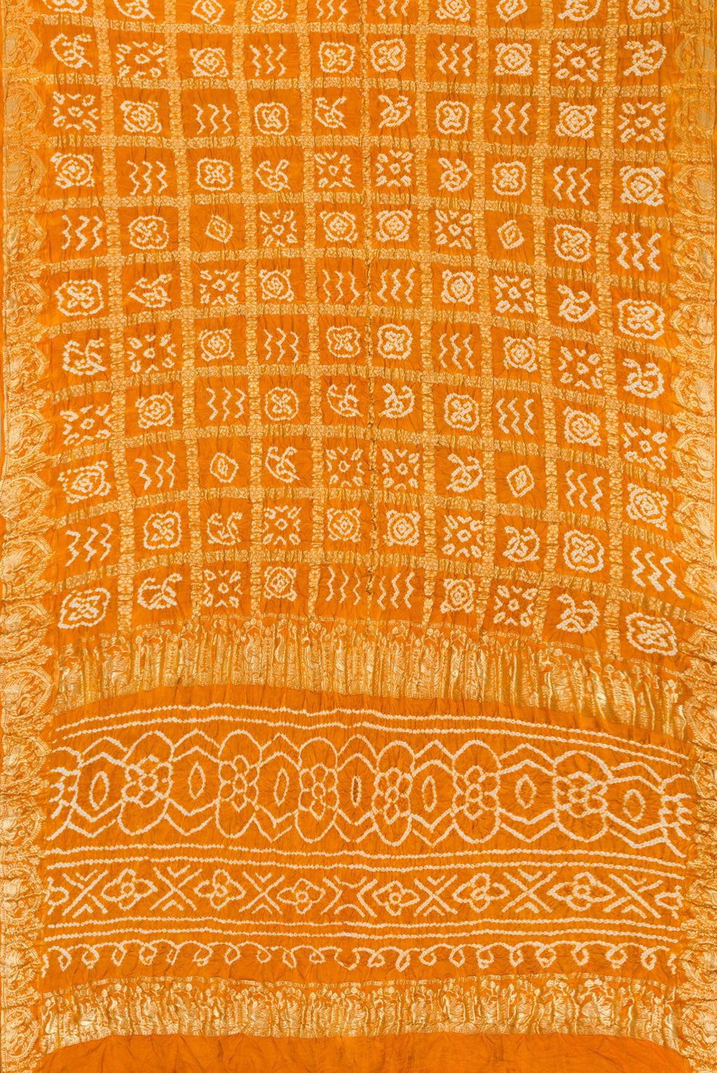 Flat view of Mustard Dual Tone Bandhani Silk Saree with Bandhani Print on the body and Zari Border. 