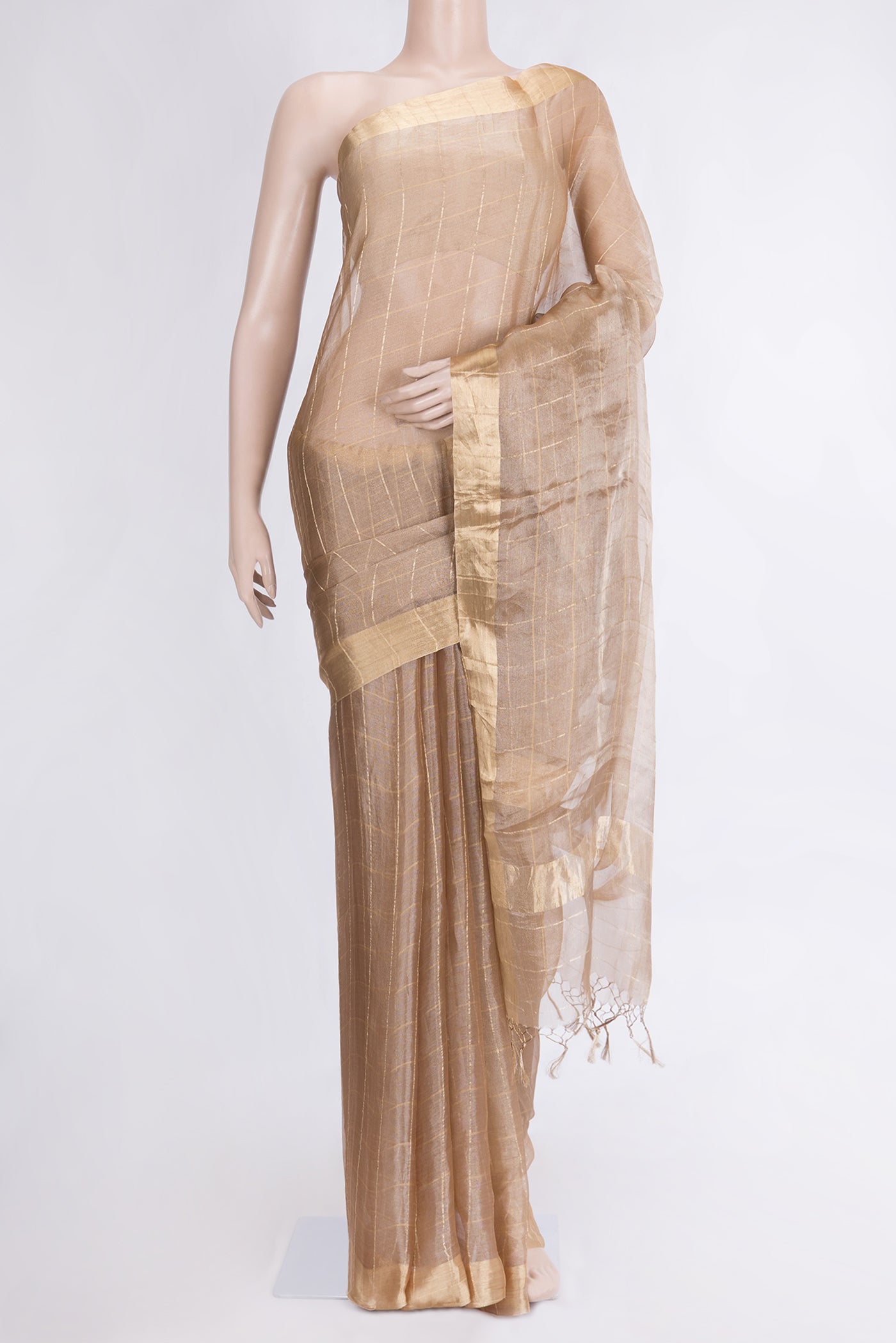 Gold Dual Tone Organza Silk Saree with Checked design on the body and Zari Border.  displayed on a mannequin