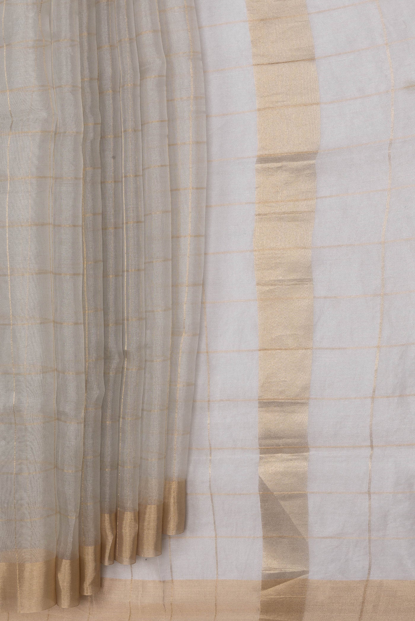 Pleats and pallu of Silver Dual Tone Organza Silk Saree with Checked design on the body and Zari Border. 