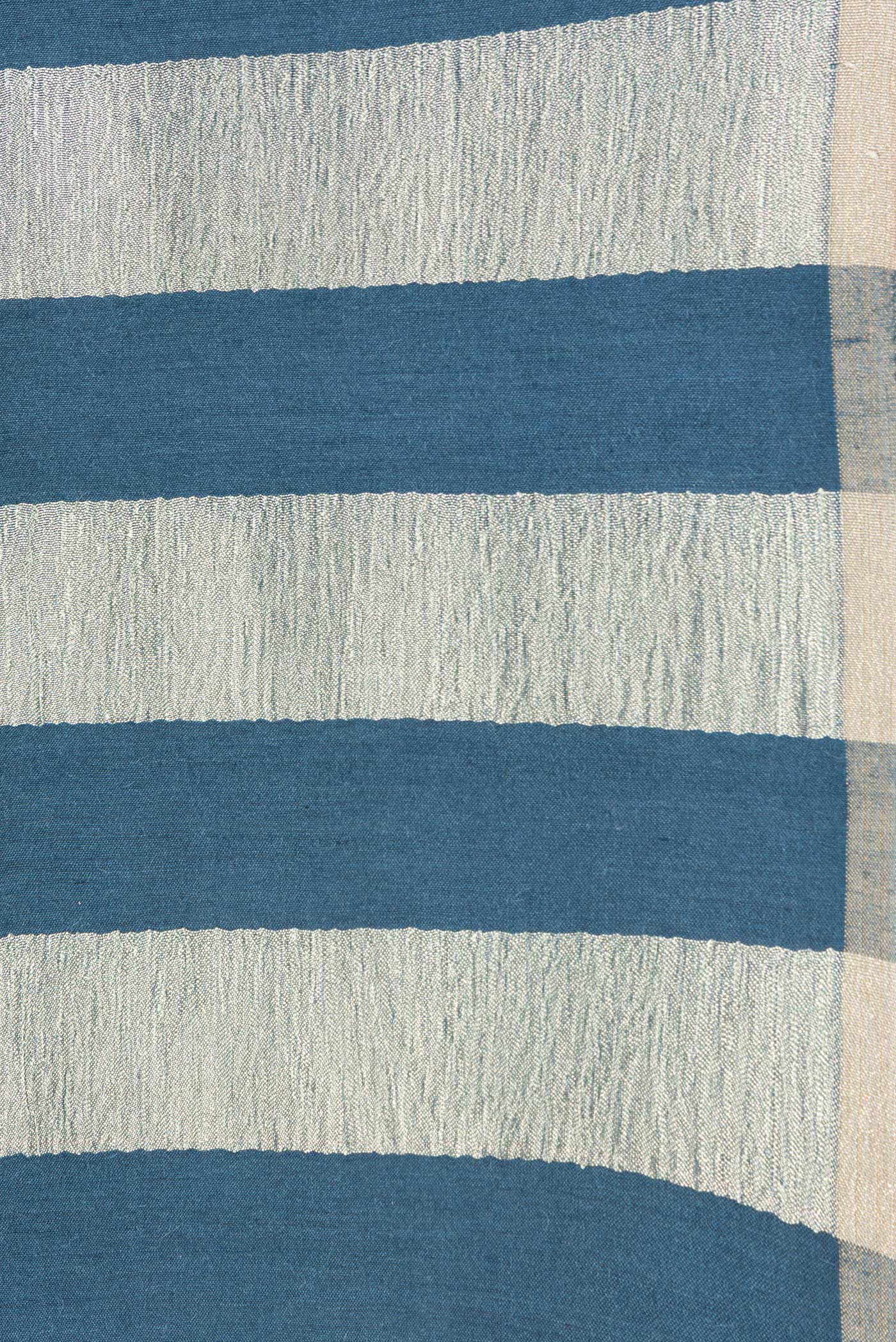 Border image of Peacock Blue Dual Tone Tussar Silk Saree with Stripes on the body and Zari Border. 