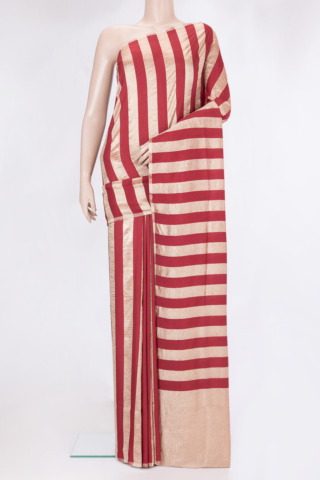 Maroon Dual Tone Tussar Silk Saree with Stripes on the body and Zari Border.  displayed on a mannequin
