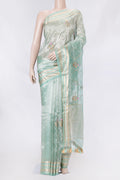 Light Blue Organza Silk Saree with Embroidery on the body and Zari Border displayed on a mannequin
