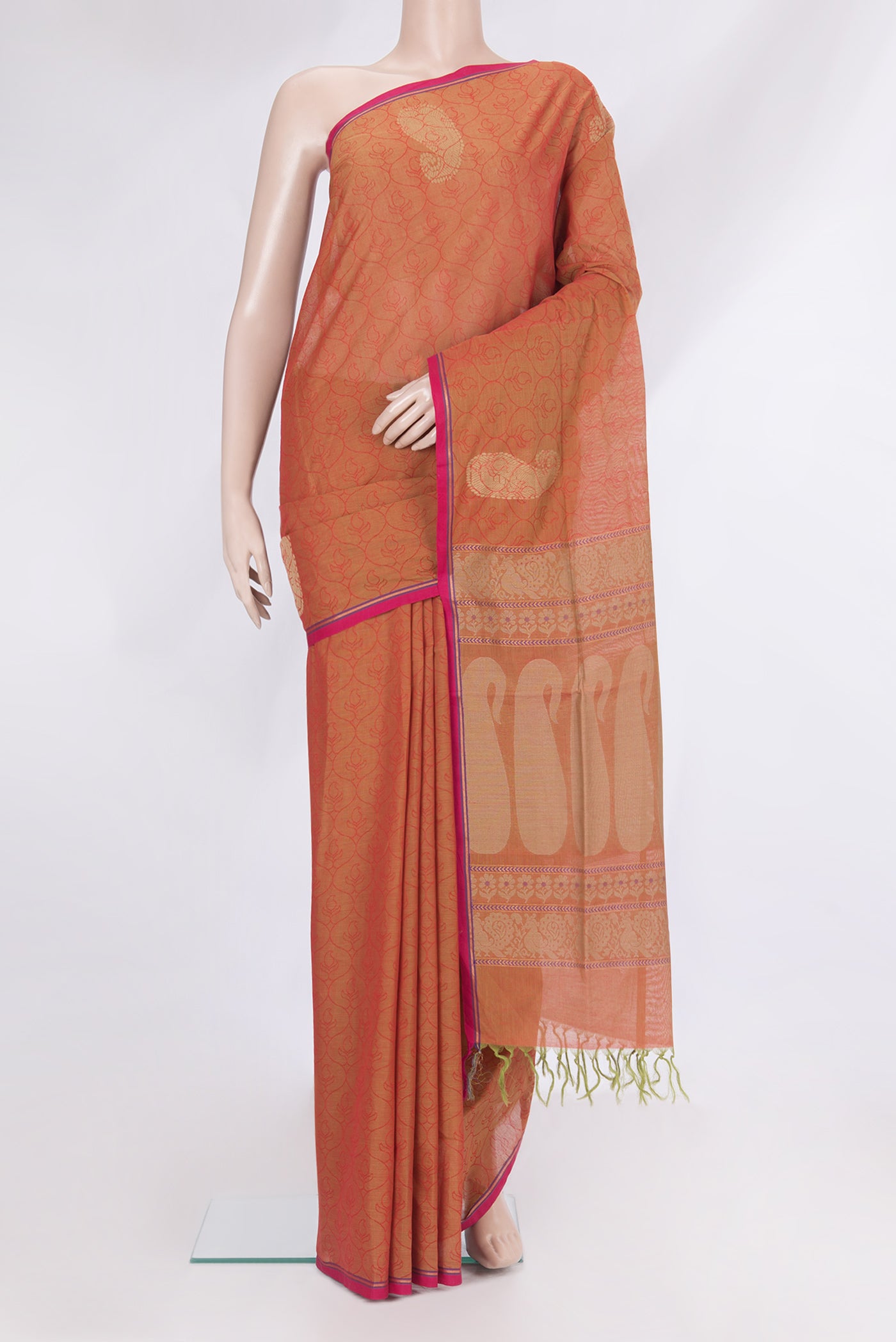 Brick Orange Dual Tone Coimbatore Cotton Saree with Jacquard design on the body and Fancy Border.  displayed on a mannequin