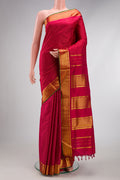 Maroon Kanjivaram Silk Nine Yards Saree with Checked design on the body and Zari Border.  displayed on a mannequin
