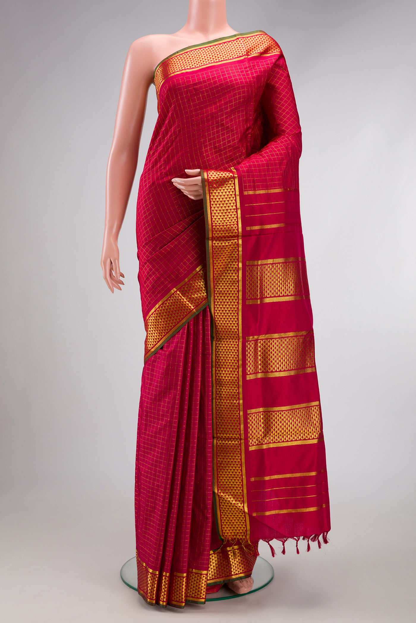 Maroon Kanjivaram Silk Nine Yards Saree with Checked design on the body and Zari Border.  displayed on a mannequin