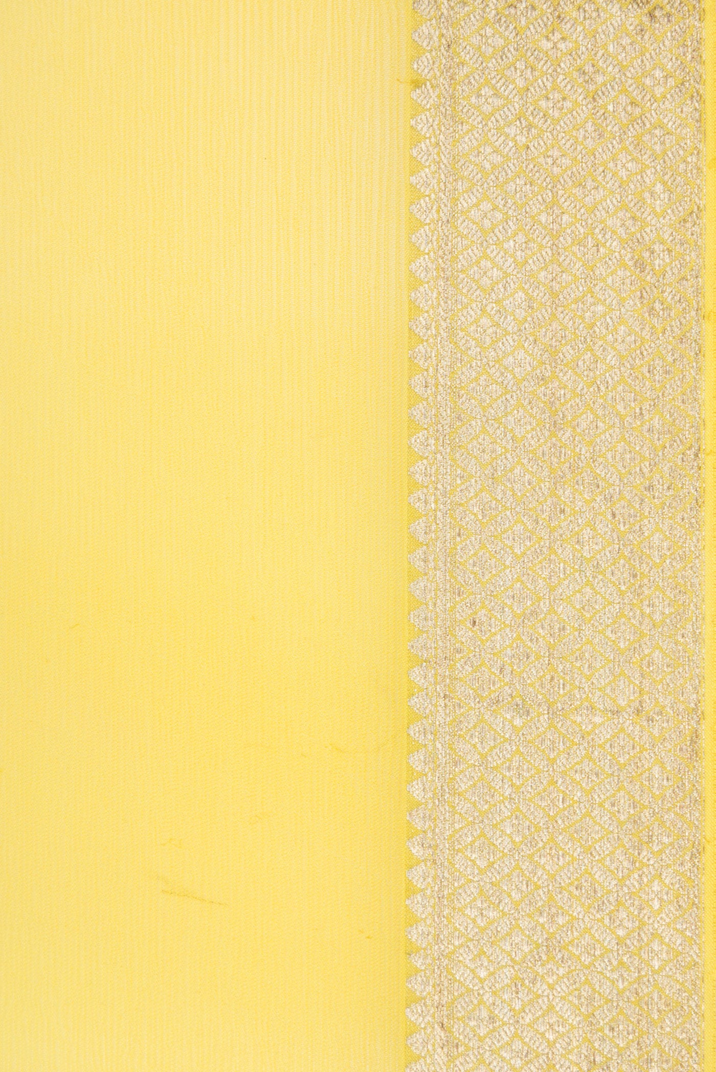 Border image of Lemon Yellow Dual Tone Mysore Chiffon Saree with Plain Body and Zari Border. 