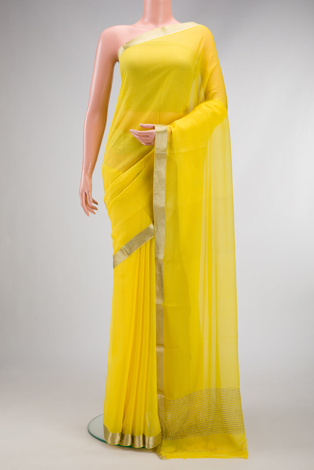 Lemon Yellow Dual Tone Mysore Chiffon Saree with Plain Body and Zari Border.  displayed on a mannequin
