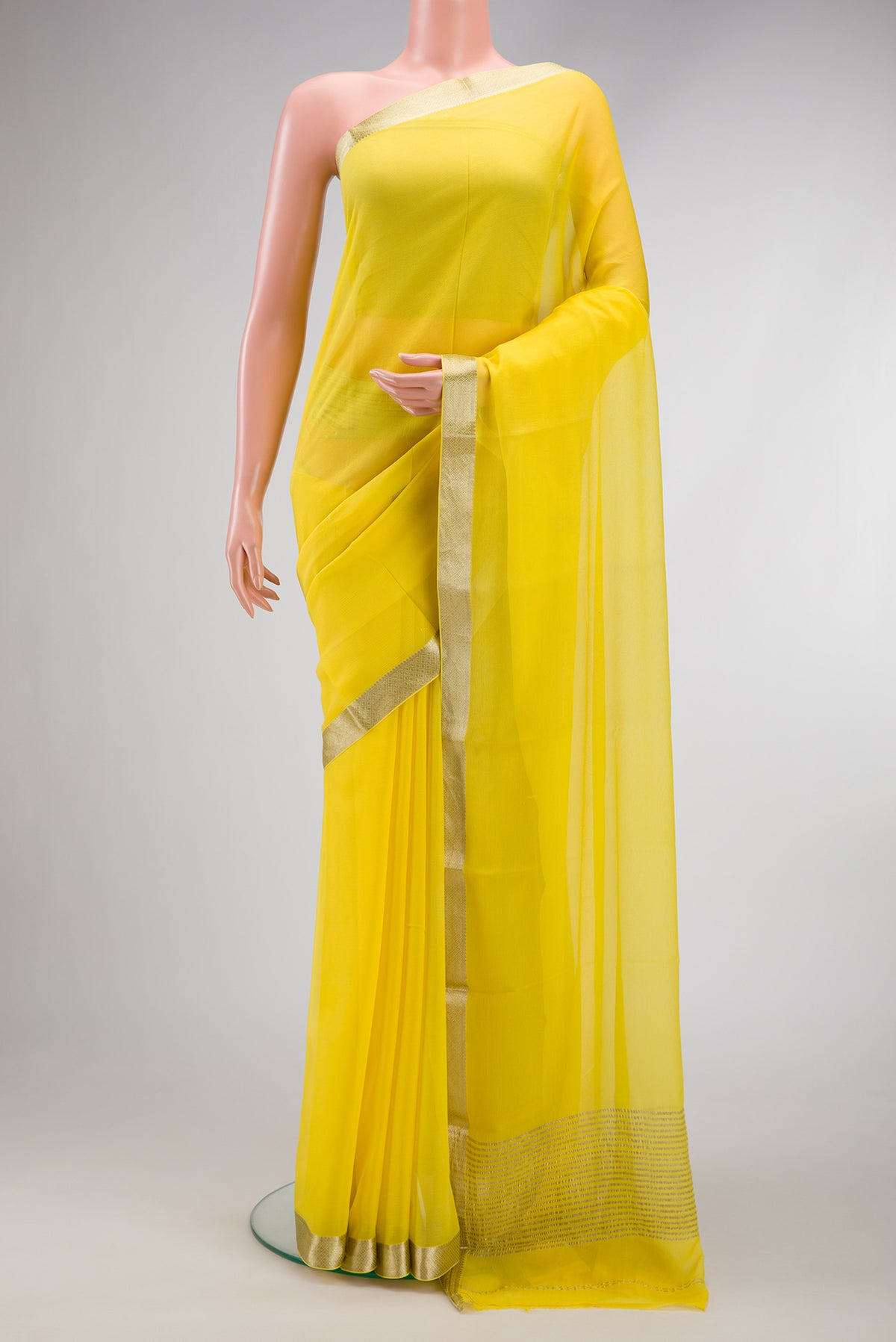 Lemon Yellow Dual Tone Mysore Chiffon Saree with Plain Body and Zari Border.  displayed on a mannequin