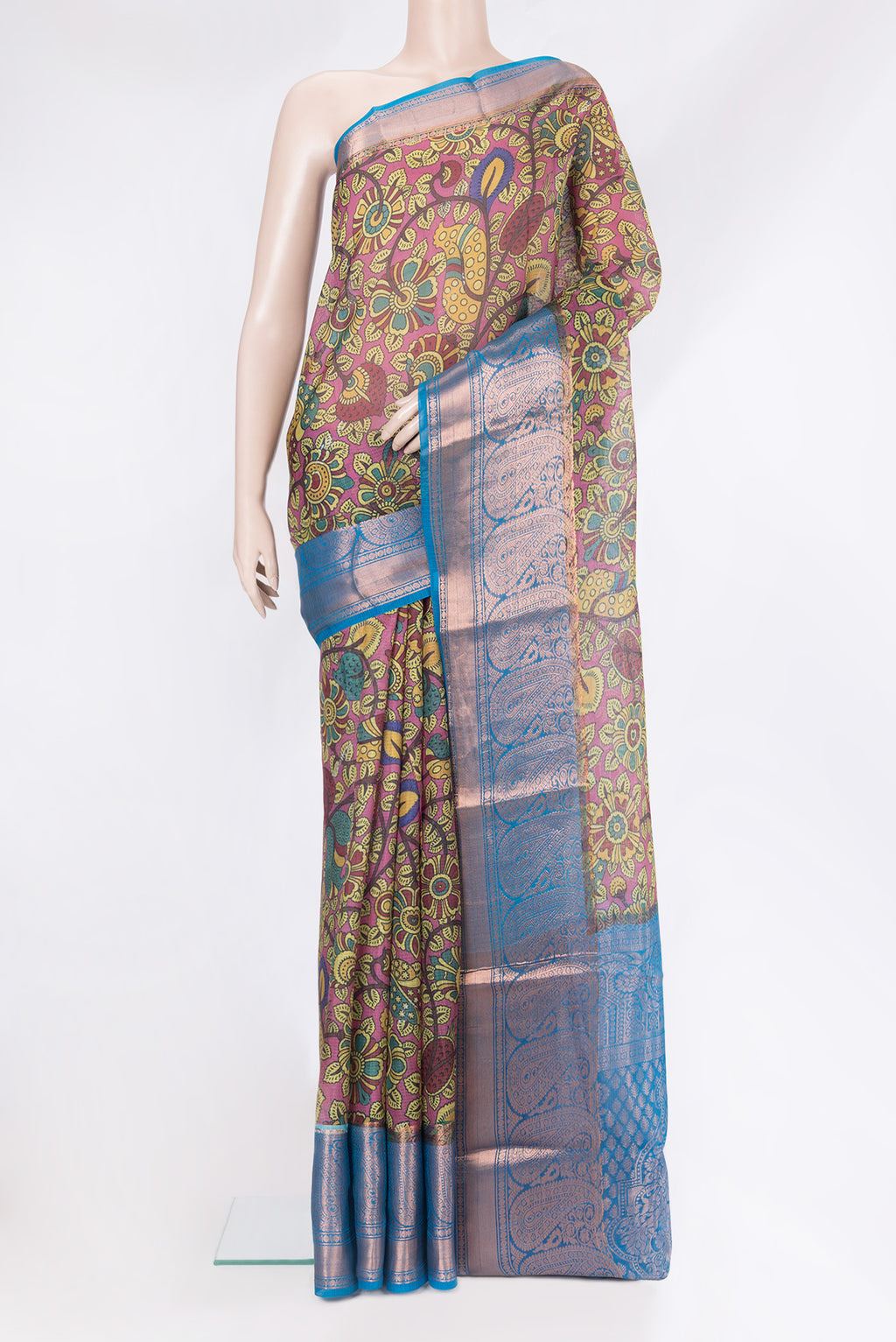 Pink Kota Silk Saree with Printed design on the body and Zari Border.  displayed on a mannequin