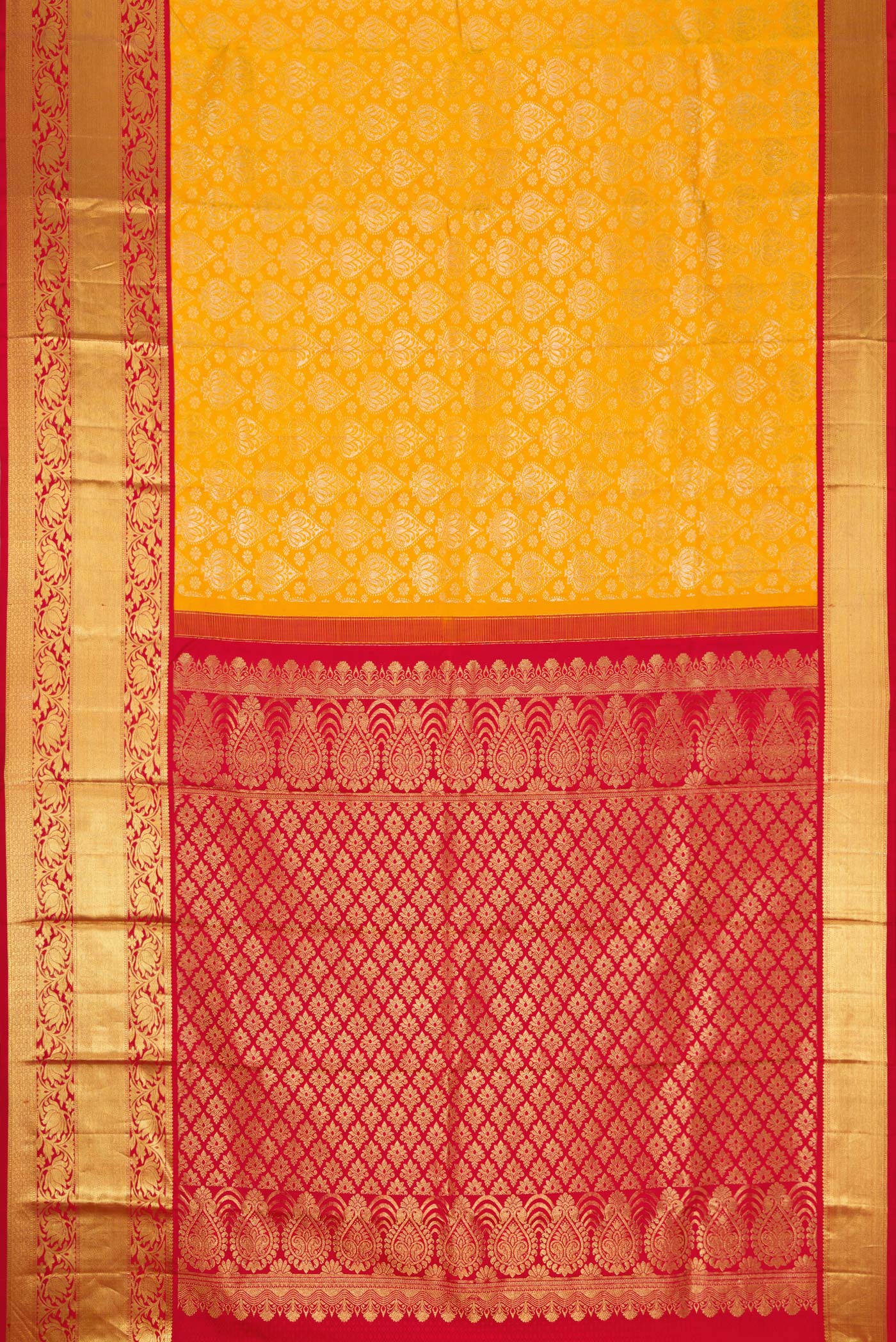 Flat view of Mustard Dual Tone Kanjivaram Silk Saree with Zari Brocade on the body and Zari Border. 