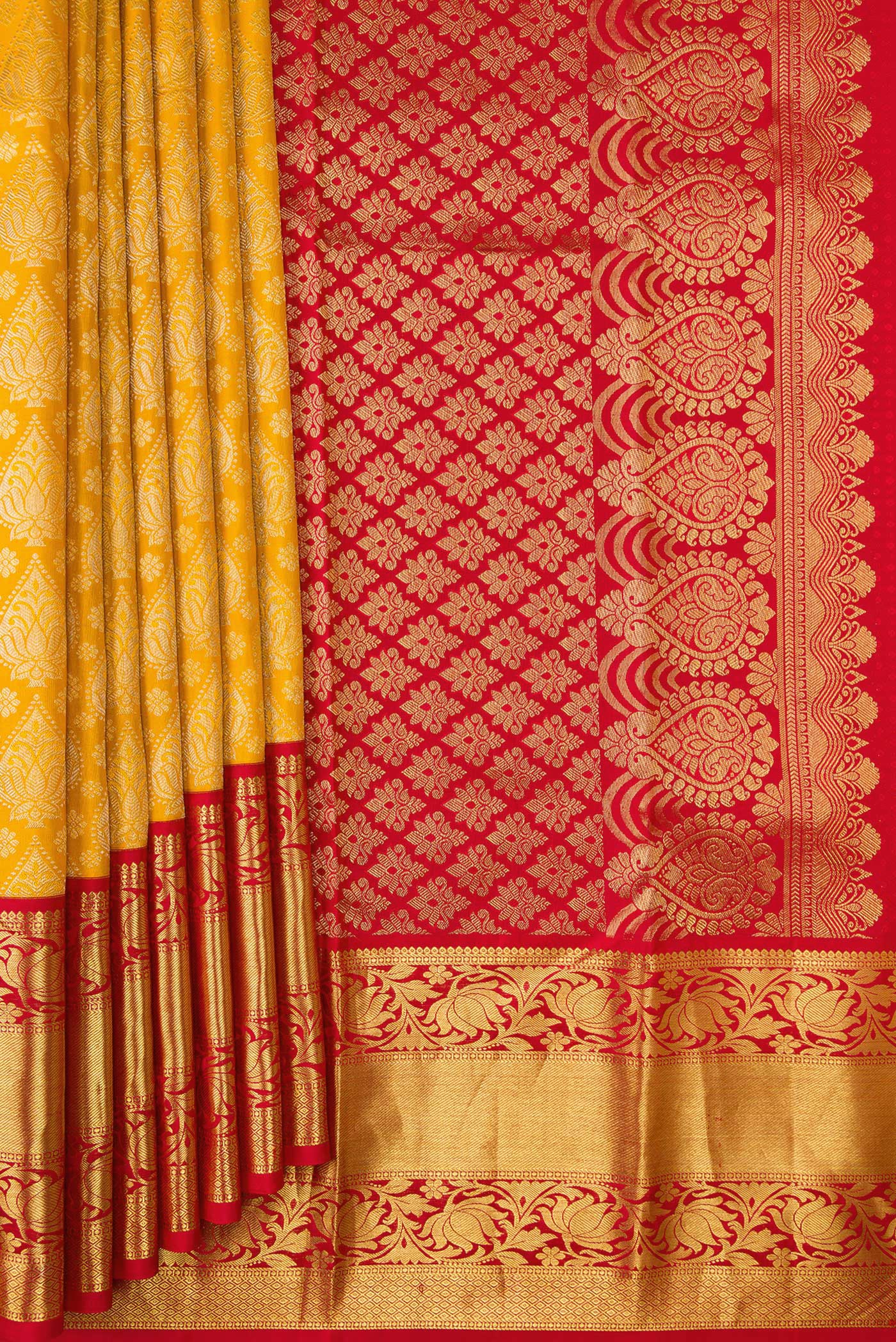 Pleats and pallu of Mustard Dual Tone Kanjivaram Silk Saree with Zari Brocade on the body and Zari Border. 