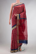 Dark Pink Dual Tone Tussar Silk Saree with Printed design on the body and Zari Border displayed on a mannequin