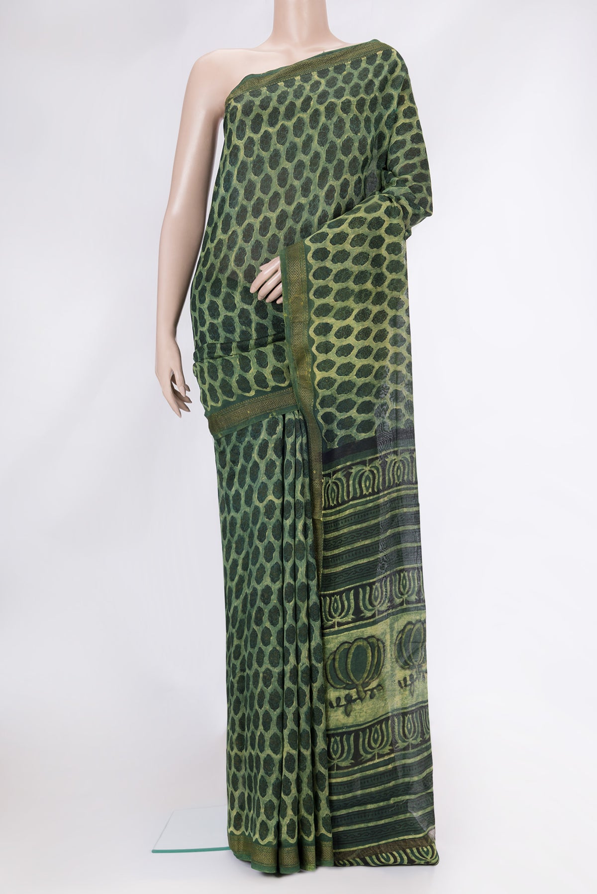 Green Dual Tone Chanderi Silk Saree with Printed design on the body and Zari Border.  displayed on a mannequin