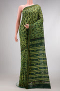 Green Dual Tone Tussar Silk Saree with Printed design on the body and Zari Border.  displayed on a mannequin
