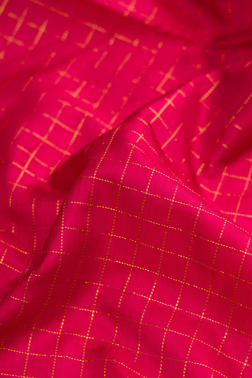 Close up of Maroon Dual Tone Kanchipuram Silk Nine Yards Saree with Checked design on the body and Zari Border.  displaying folds