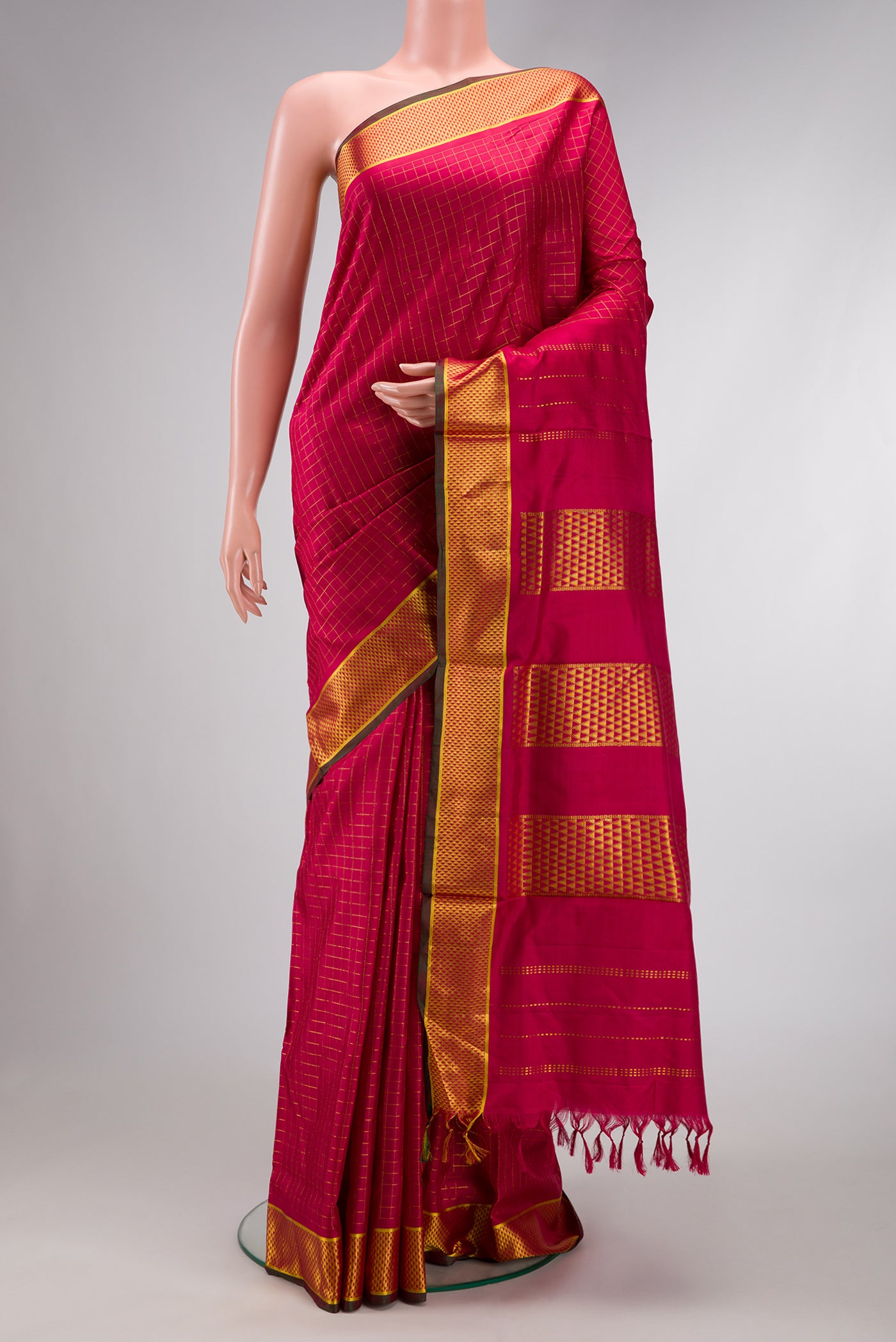 Maroon Dual Tone Kanchipuram Silk Nine Yards Saree with Checked design on the body and Zari Border.  displayed on a mannequin