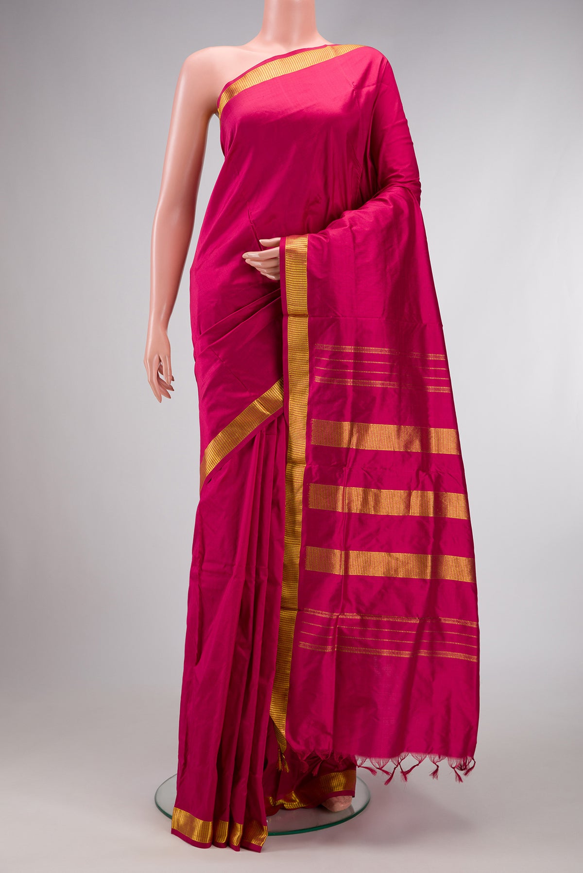 Dark Mauve Dual Tone Kanchipuram Silk Nine Yards Saree with Plain Body and Zari Border.  displayed on a mannequin
