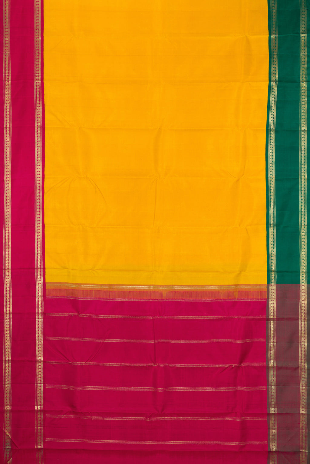 Flat view of Pure Silk Pure Zari Mustard Kanjivaram Saree with Plain Body and Ganga Jamuna Border. 