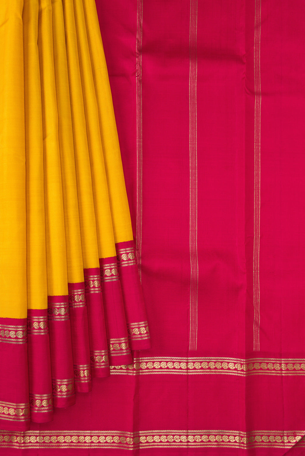 Pleats and pallu of Pure Silk Pure Zari Mustard Kanjivaram Saree with Plain Body and Ganga Jamuna Border. 