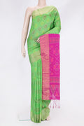Green Dual Tone Raw Silk Saree with Ikat Print on the body and Zari Border.  displayed on a mannequin