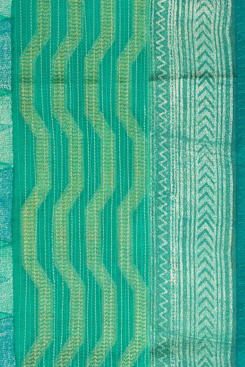 Border image of Sea Green Dual Tone Tussar Silk Saree with Printed design on the body and Zari Border. 