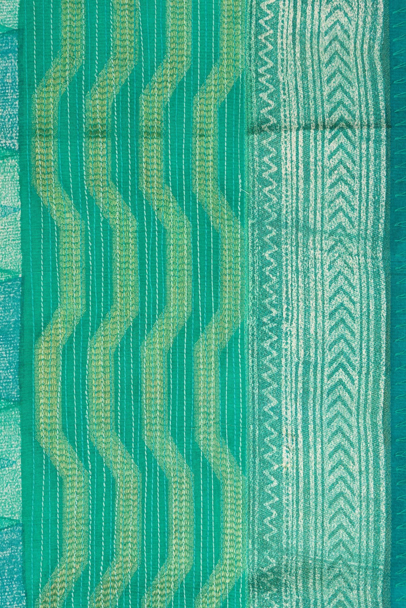 Border image of Sea Green Dual Tone Tussar Silk Saree with Printed design on the body and Zari Border. 