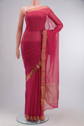 Coral Mysore Chiffon Saree with Plain Body and Zari Border displayed on a mannequin