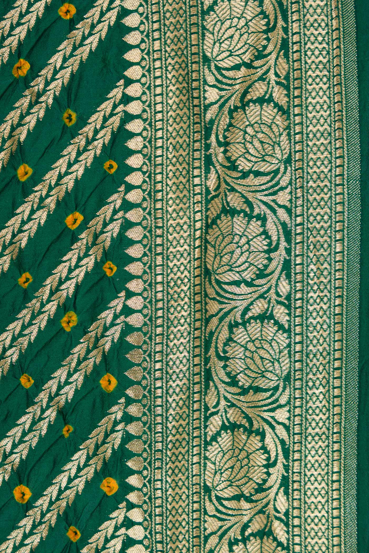 Border image of Bottle Green Dual Tone Bandhani Silk Saree with Bandhani Print on the body and Zari Border. 