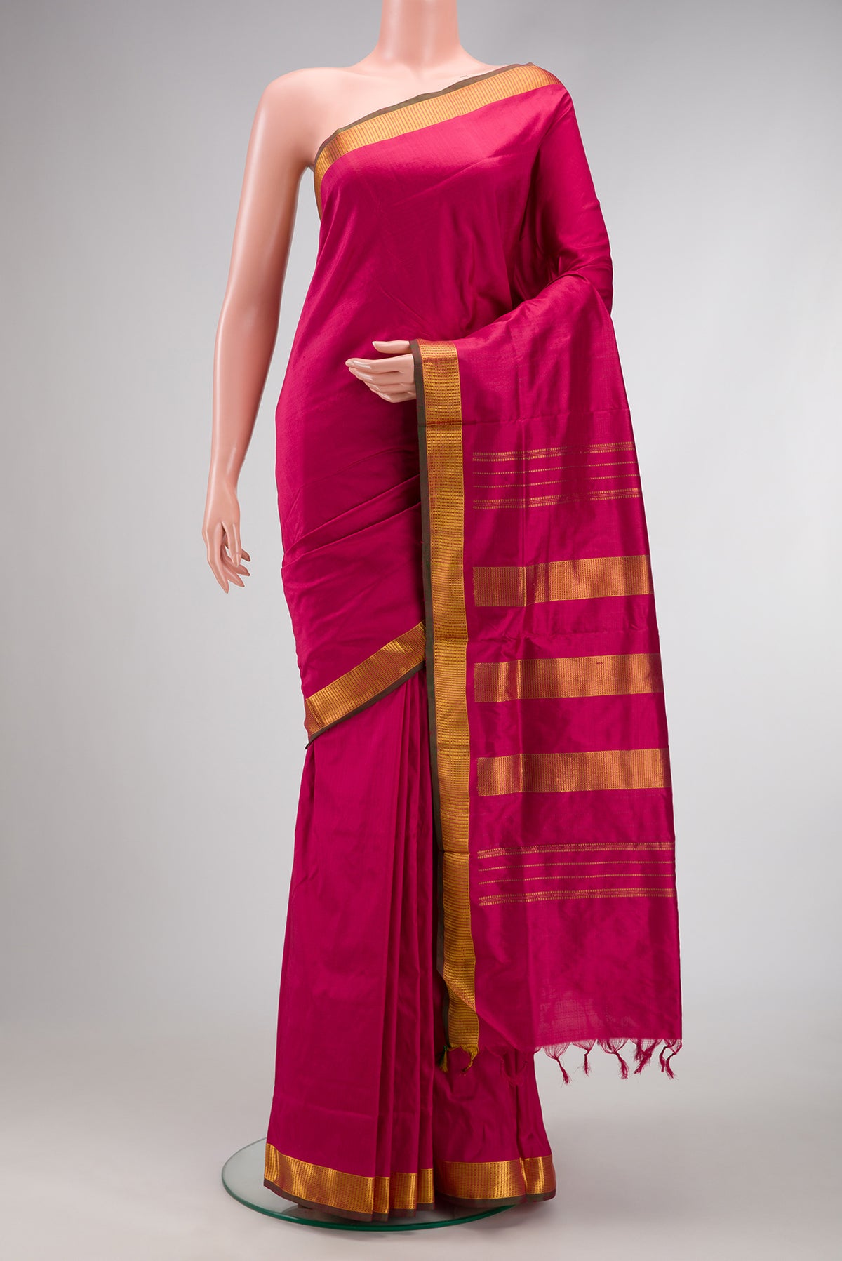 Maroon Dual Tone Kanchipuram Silk Nine Yards Saree with Plain Body and Zari Border.  displayed on a mannequin