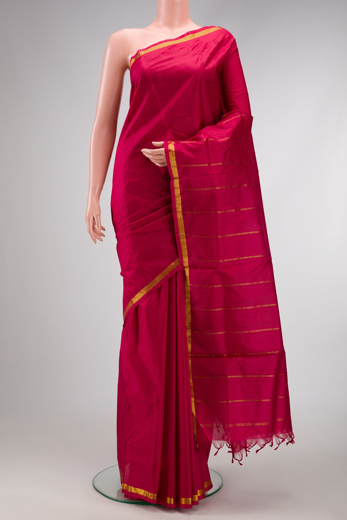 Maroon Dual Tone Kanchipuram Silk Nine Yards Saree with Plain Body and Zari Border.  displayed on a mannequin