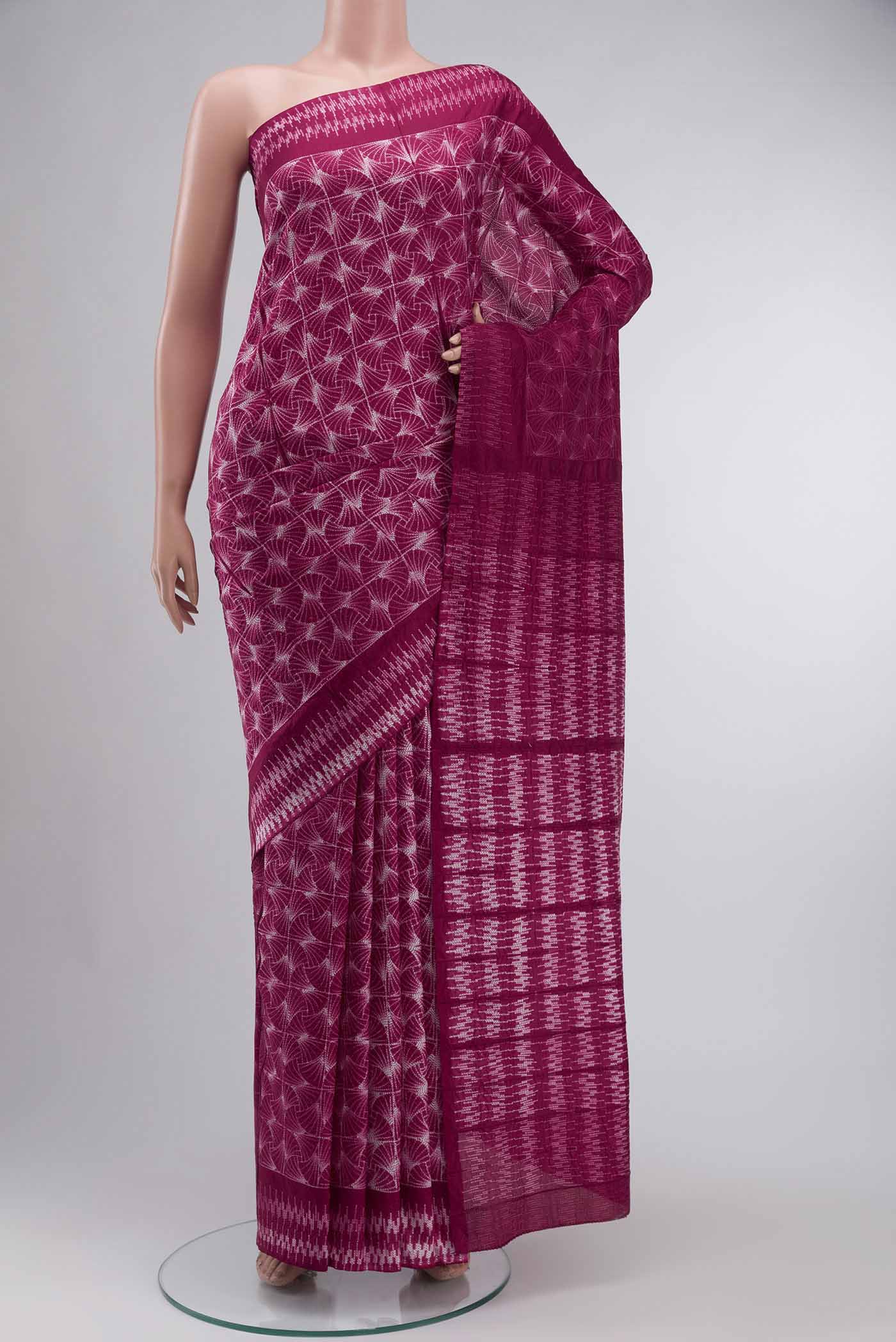Maroon Printed Silk Saree Printed design on the body and Without Border displayed on a mannequin