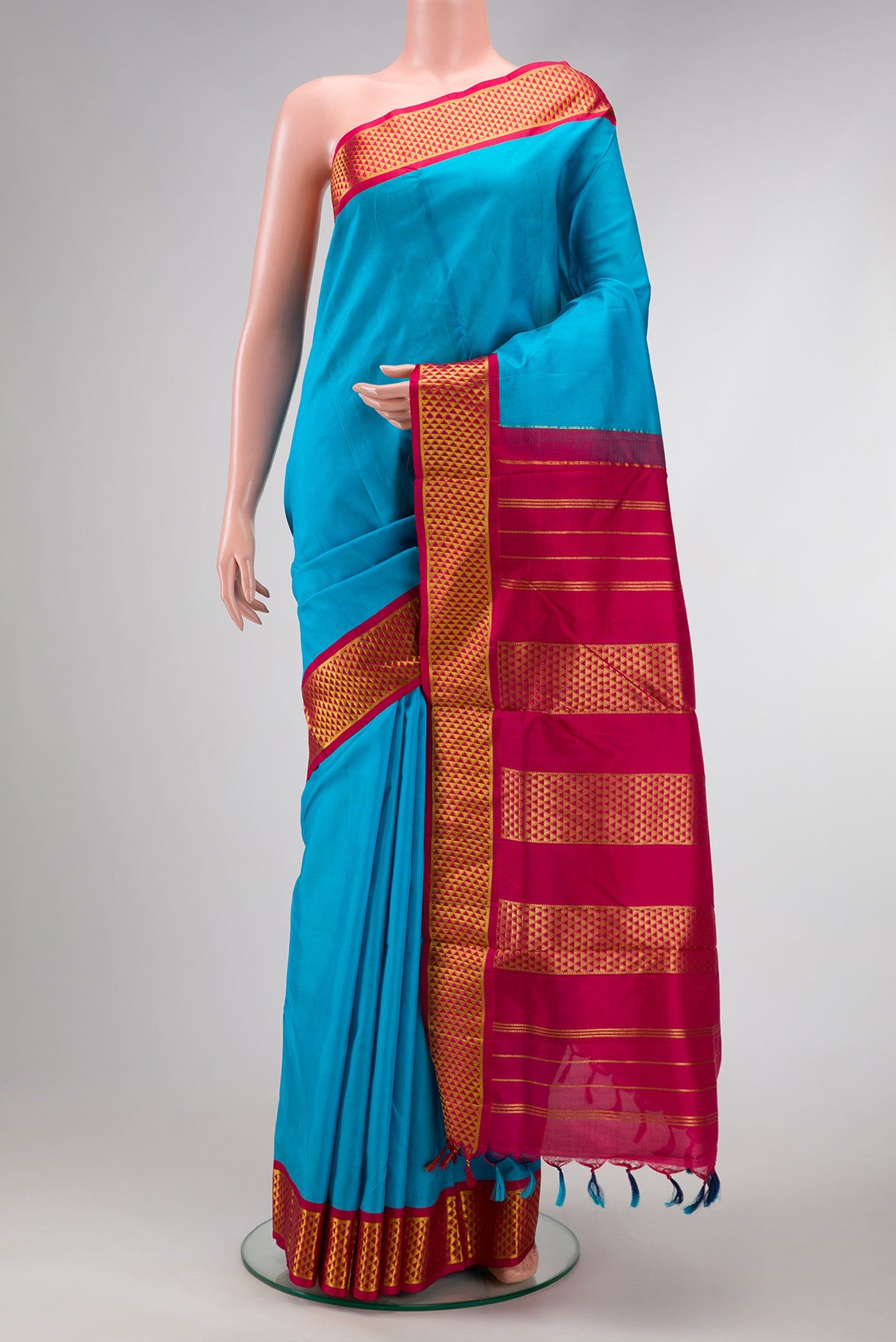 Sky Blue Dual Tone Kanjivaram Silk Nine Yards Saree with Plain Body and Zari Border.  displayed on a mannequin