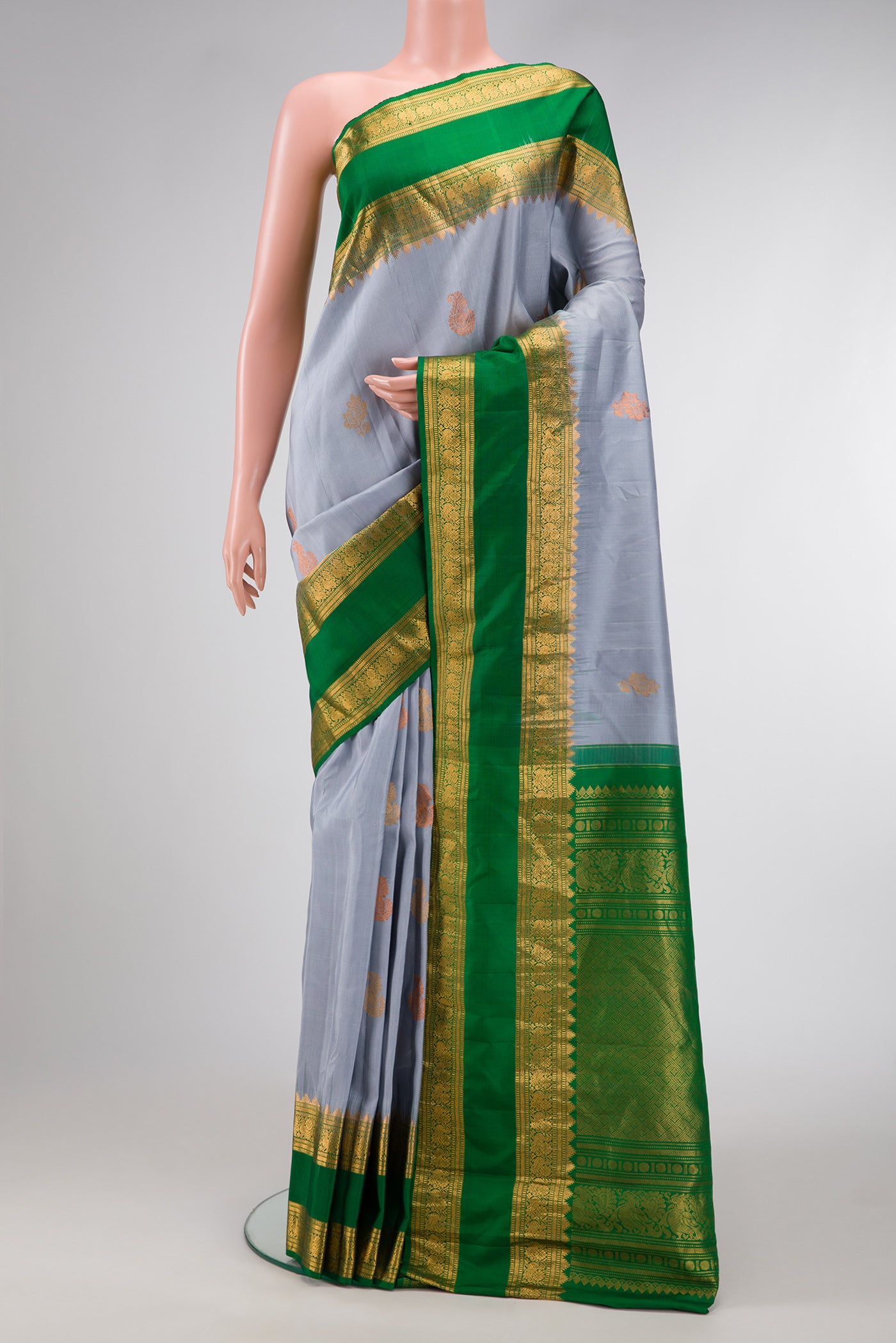 Grey Dual Tone Gadwal Silk Saree with Zari Butta on the body and Zari Border.  displayed on a mannequin