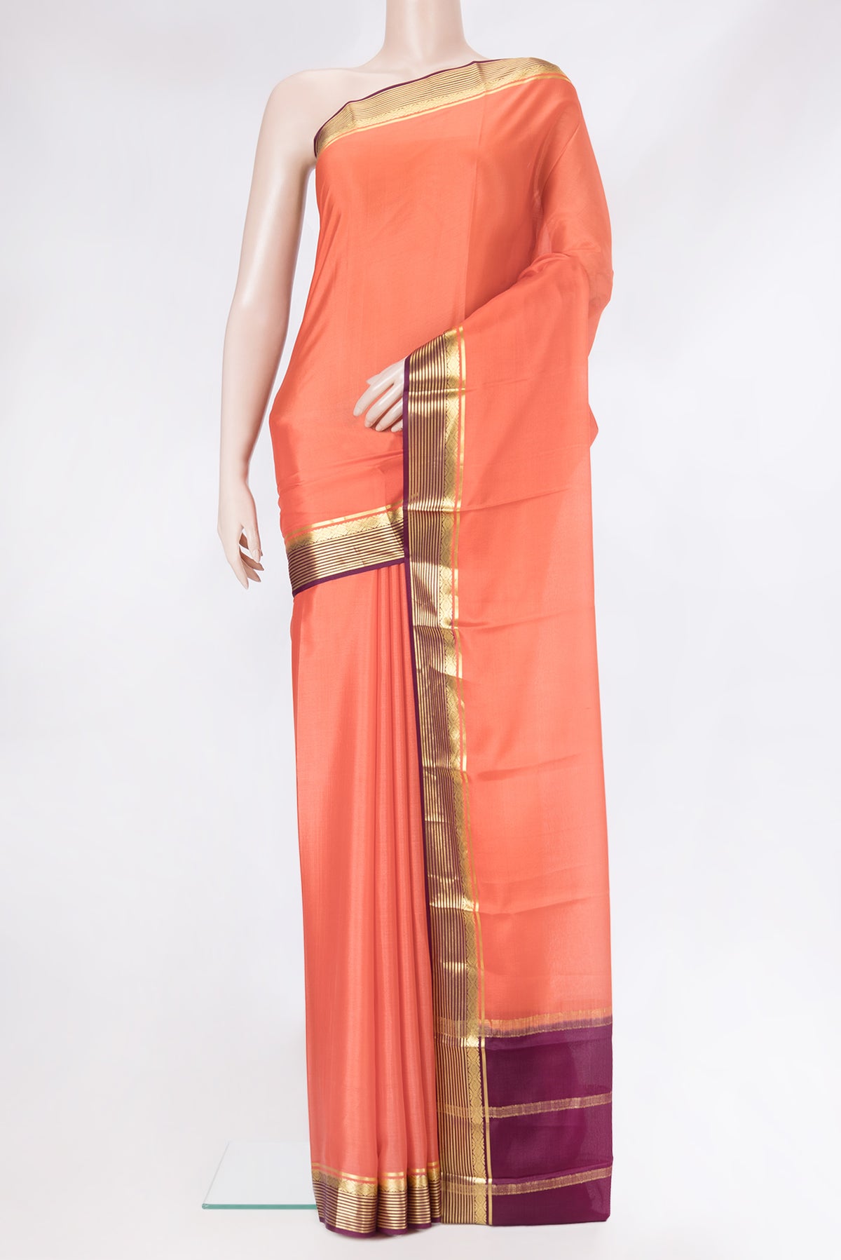 Peach Dual Tone Mysore Silk Saree with Plain Body and Zari Border.  displayed on a mannequin