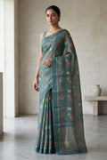 Model wearing a Grey Mysore Georgette SareePrinted design on the body and Zari Border.