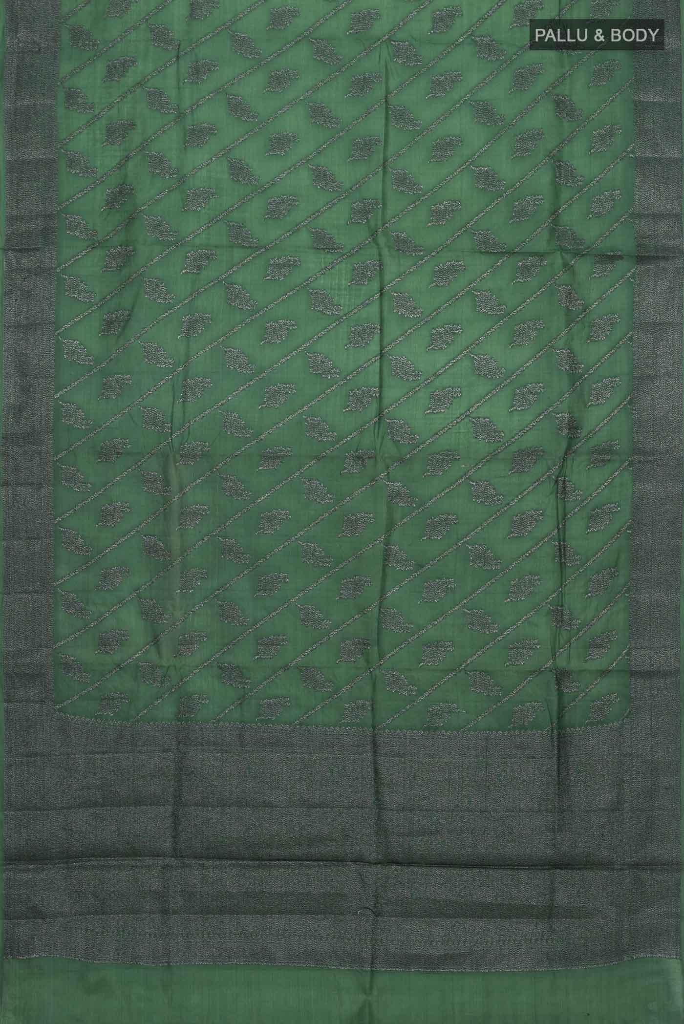 Flat view of Green Banarasi Tussar Silk Saree with Zari And Thread Butta on the body and Zari And Thread Border