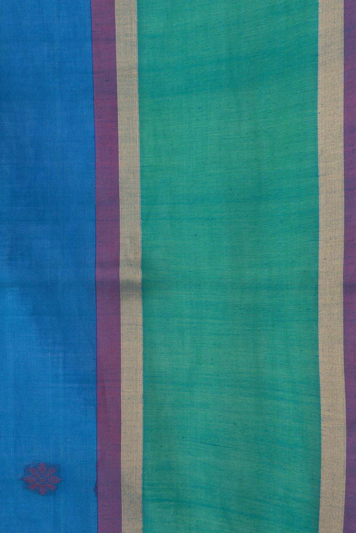Border image of Sky Blue Dual Tone Silk Cotton Saree with Zari Butta on the body and Zari Border. 