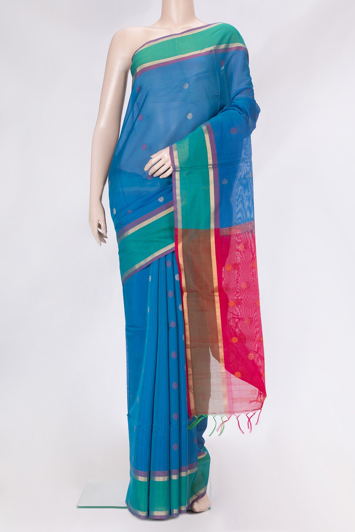 Sky Blue Dual Tone Silk Cotton Saree with Zari Butta on the body and Zari Border.  displayed on a mannequin